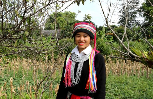 Dao girl in her traditional clothes and silver necklaces
