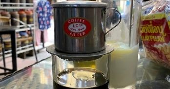 Enjoying Vietnamese coffee - a charming beauty in Vietnamese culture