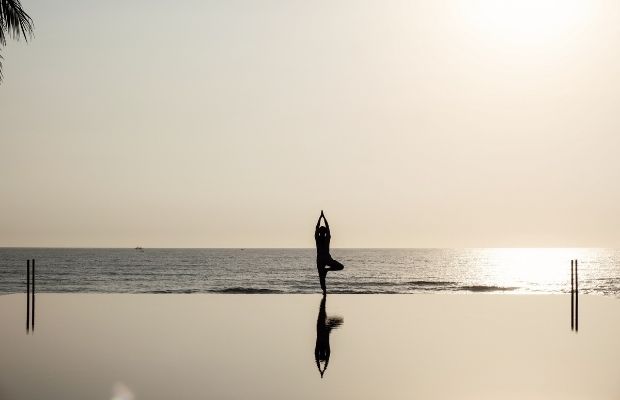 Doing yoga in a wellness retreat